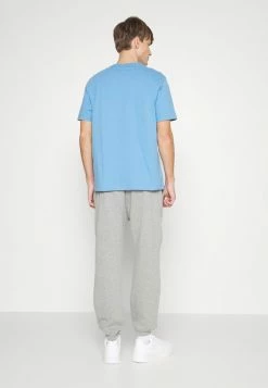 Jack & Jones JPSTCAPIO PANTS UNISEX - Tracksuit Bottoms - Light Grey Melange -Jack & Jones Shop 2c215bd4fc07438fa2b671b16231c40e