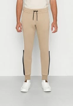 Jack & Jones JJIWILL LOGO JJBLOCKING P. VG NOOS - Tracksuit Bottoms - Crockery
