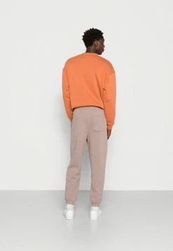Jack & Jones JJIKANE BRINK CLUB - Tracksuit Bottoms - Fungi/sun Orange -Jack & Jones Shop 4a6fb51ee9d348b9a1975b41f69e8cab