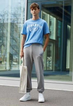 Jack & Jones JPSTCAPIO PANTS UNISEX - Tracksuit Bottoms - Light Grey Melange