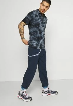 Jack & Jones JJISIMUL PANTS - Tracksuit Bottoms - Cloud Dancer -Jack & Jones Shop 90d64a752f464c65b9f7469bb9274f19
