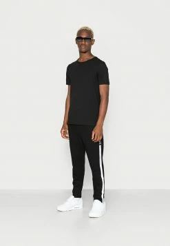 Alternative view of Jack & Jones JPSTACE JJADAM PANTS - Tracksuit Bottoms - Black